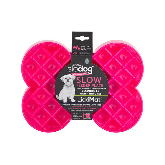 Pink bone shaped slow feeder bowl